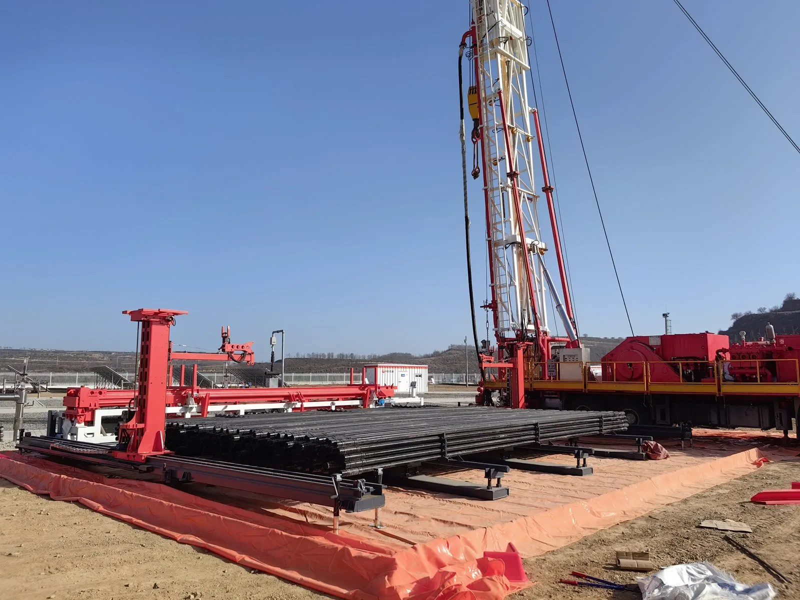 Powered catwalk and pipe racking equipment at a wellsite